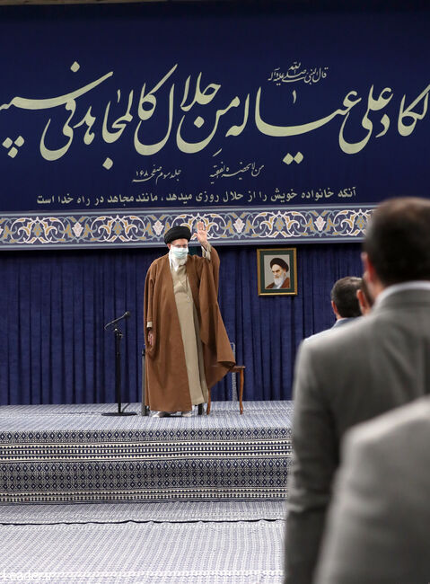 The Supreme Leader of the Islamic Revolution in a group meeting of workers