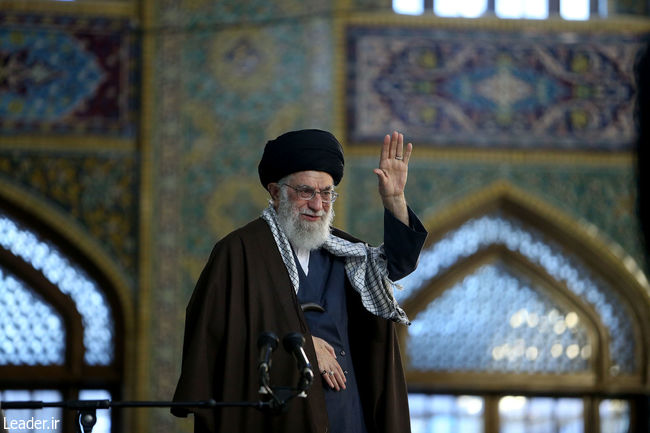 Ayatollah Khamenei addressing a large gathering of people at Imam Reza Shrine in Mashhad