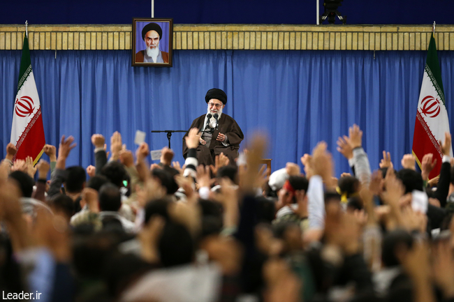 Ayatollah Khamenei delivering a speech among Basij forces.